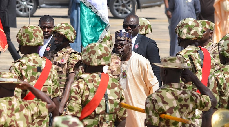Nigerian President Bola Tinubu (center) arrives at the Airforce Base in Maiduguri on Dec. 11, 2023. Nigeria has been the site of persecution against Christians. (Audu Marte/AFP via Getty Images/TNS)