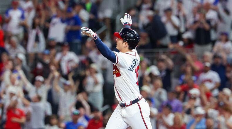 Atlanta Braves left fielder Mike Yastrzemski (18) runs after hitting a home run in the fifth inning of the Braves versus Cubs game at Truist Park in Atlanta on May 12, 2026. (Arvin Temkar/AJC)