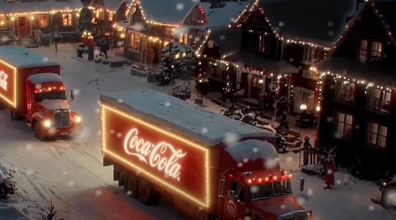 Coca-Cola partnered with generative AI companies to make new iterations of its classic 1995 ad “Holidays Are Coming.” Shots of lighted Coca-Cola trucks on snowy roads and mountains, like the one pictured here, along with smiling townspeople and other holiday imagery, were rendered using AI models.