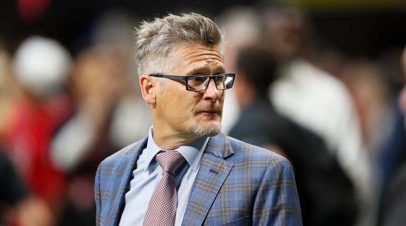 Falcons GM Thomas Dimitroff surveys the field during warmups.  Bob Andres / robert.andres@ajc.com