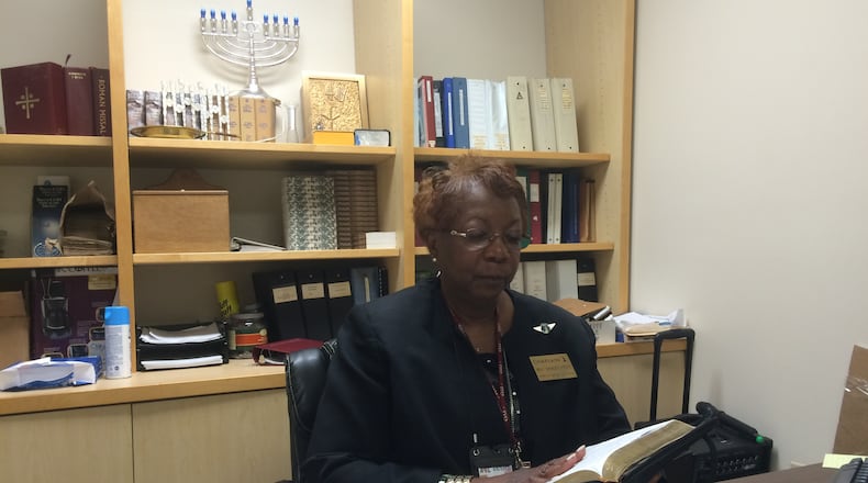 Rev. Shirley Petty offered words of solace to travelers after the worst mass shooting in U.S. history. Photo: Jennifer Brett