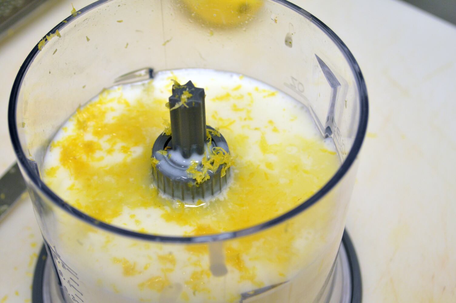 Add two sprigs of basil leaves