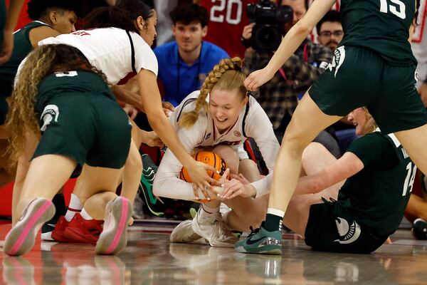 North Carolina State's Tilda Trygger (18) struggles to control the ball against Michigan State during the first half in the second round of the NCAA college basketball tournament in Raleigh, N.C., Monday, March 24, 2025. (AP Photo/Karl DeBlaker)