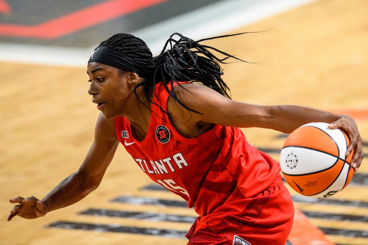 Atlanta Dream guard Tiffany Hayes (15) drives to the basket during a WNBA basketball game against the Dallas Wings, Thursday, May 27, 2021, in College Park, Ga. The Atlanta Dream won 101-95. (AP Photo/Danny Karnik)