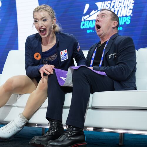 Amber Glenn reacts to seeing her scores after competing during the women's free skating competition at the U.S. Figure Skating Championships, Friday, Jan. 9, 2026, in St. Louis. (AP Photo/Stephanie Scarbrough)