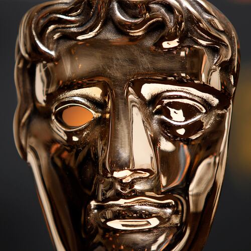 FILE - A BAFTA mask after the nominations for the Orange British Academy Film Awards 2011 were announced, Tuesday, Jan. 18, 2011, in Piccadilly, London. (AP Photo/Joel Ryan, File)