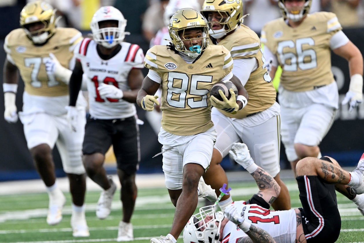 Georgia Tech wide receiver Jordan Allen (center) runs for a long first down during the second half of a game against Gardner-Webb at Bobby Dodd Stadium, Saturday, Sept. 6, 2025 in Atlanta. Georgia Tech won 59-12 over Gardner-Webb. (Hyosub Shin/AJC)