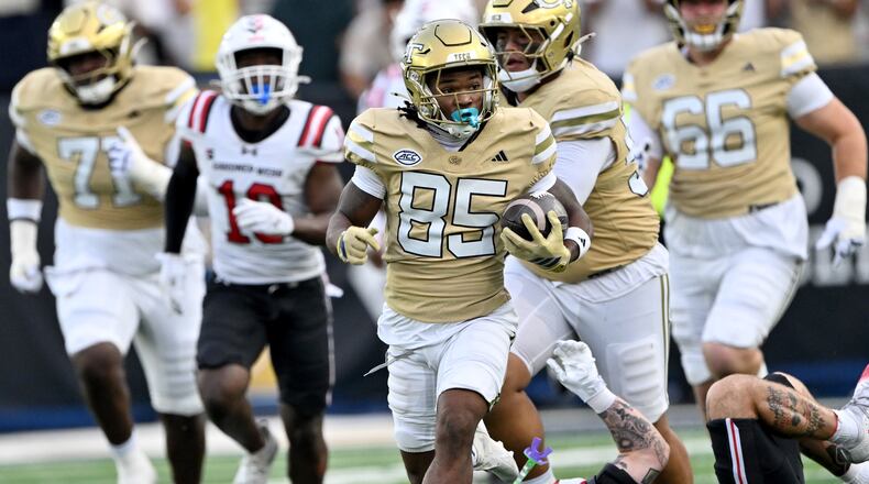 Georgia Tech wide receiver Jordan Allen (center) runs for a long first down during the second half of a game against Gardner-Webb at Bobby Dodd Stadium, Saturday, Sept. 6, 2025 in Atlanta. Georgia Tech won 59-12 over Gardner-Webb. (Hyosub Shin/AJC)
