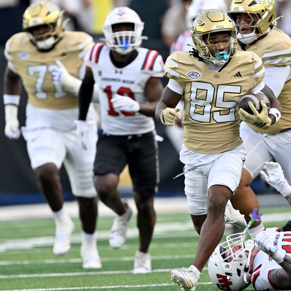 Georgia Tech wide receiver Jordan Allen (center) runs for a long first down during the second half of a game against Gardner-Webb at Bobby Dodd Stadium, Saturday, Sept. 6, 2025 in Atlanta. Georgia Tech won 59-12 over Gardner-Webb. (Hyosub Shin/AJC)