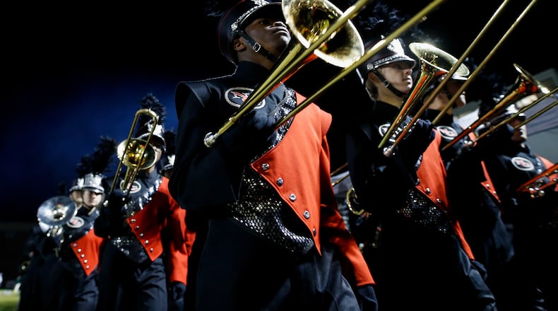 Members of the North Gwinnett High School band make their way into the stadium before a 2107 football game in Suwanee, Georgia. (File photo)