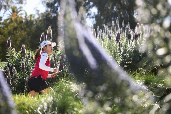 Ayaka Furue walks to the third tee during the final round of the LPGA's JM Eagle LA Championship golf tournament at El Caballero Country Club, in Los Angeles, April 20, 2025. (AP Photo/Jessie Alcheh)