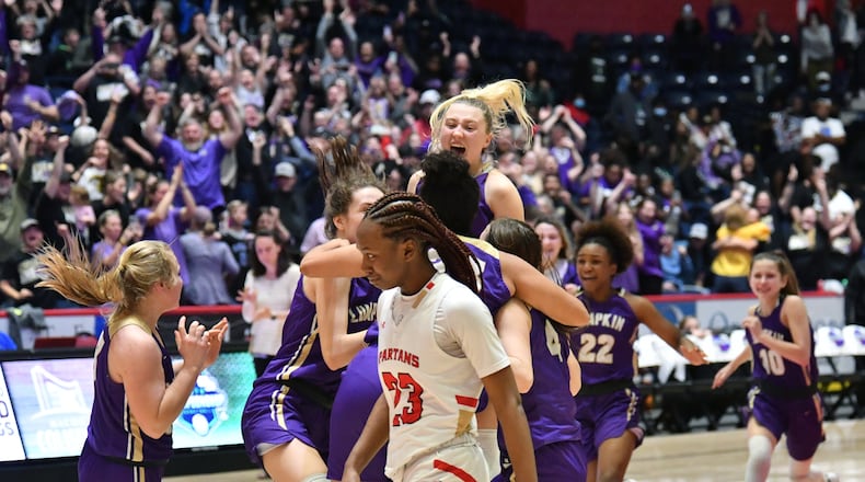 March 11, 2022 Macon - Greater Atlanta Christian's Trinity Thomas (23) reacts as Lumpkin County players celebrate their victory over Greater Atlanta Christian during the 2022 GHSA State Basketball Class AAA Girls Championship game at the Macon Centreplex in Macon on Friday, March 11, 2022. (Hyosub Shin / Hyosub.Shin@ajc.com)
