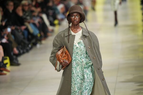 A model wears a creation as part of the Miu Miu Fall/Winter 2025-2026 Womenswear collection presented Tuesday, March 11, 2025. in Paris. (Photo by Scott A Garfitt/Invision/AP)