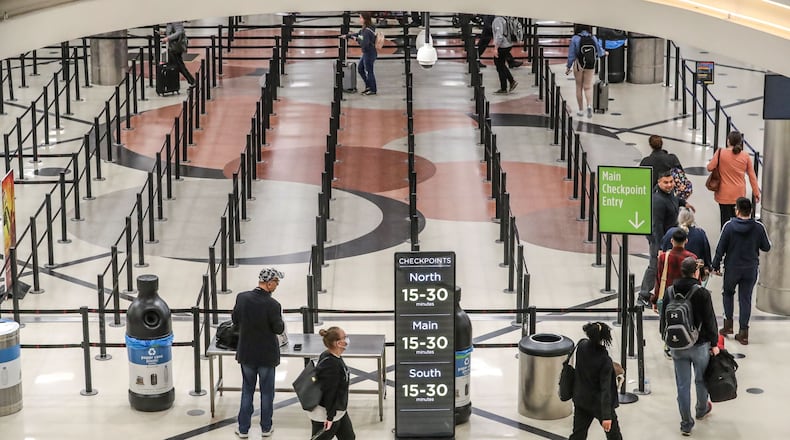 The security lines were thin at 6;34 A.M. at Hartsfield-Jackson International Airport on Friday, March 13, 2020. JOHN SPINK/JSPINK@AJC.COM