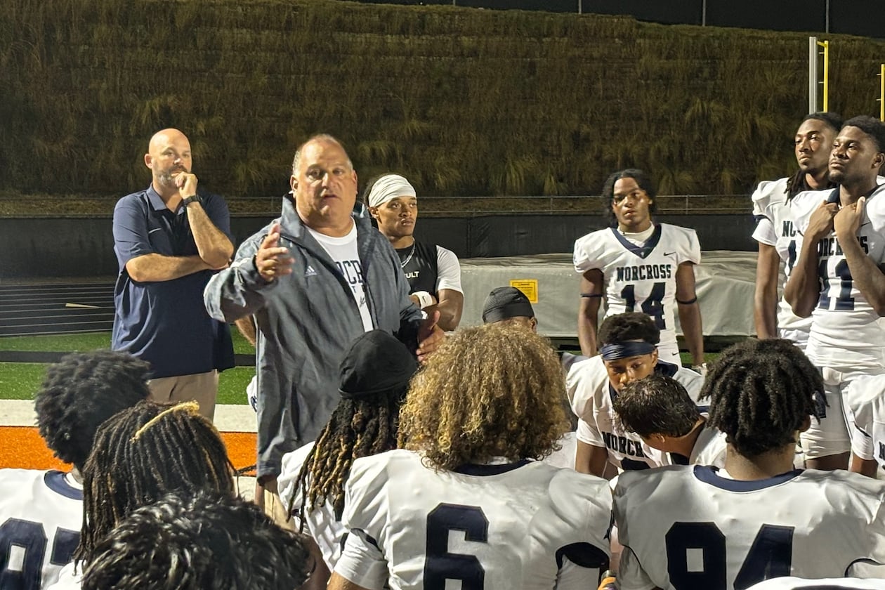 Norcross coach Keith Maloof talks to his team after its 31-10 win over Lanier, Aug. 17, 2024.