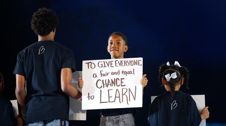 A presentation at the inaugural Beloved Benefit event at Mercedes-Benz Stadium in 2019. (Photo by Todd Kirkland/Invision for Beloved Benefit/AP Images)