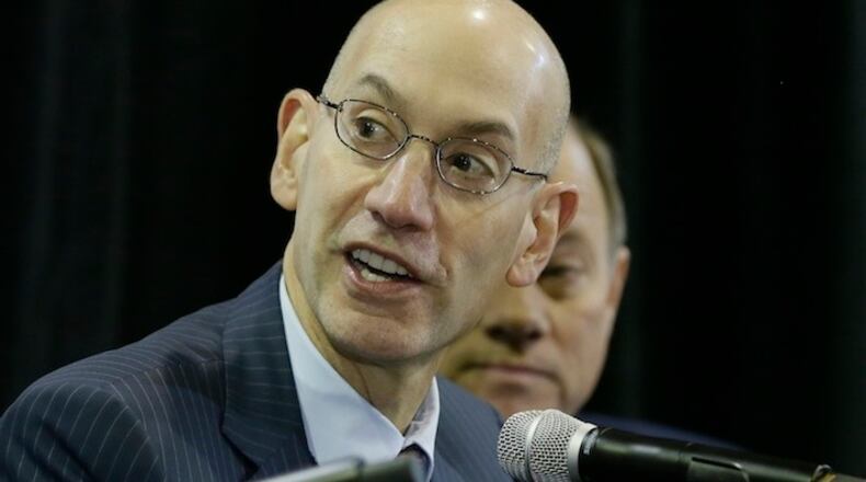National Basketball Association commissioner Adam Silver, addresses the media at the S.A.Y. Detroit Play Center, Monday, Jan. 18, 2016 in Detroit. The Pistons are helping support a former city of Detroit recreation center that's being revived with help from Detroit Lions quarterback Matthew Stafford and best-selling author Mitch Albom. Gores announced a $600,000 pledge over six years. The basketball court will be renovated and renamed "Detroit Pistons Court." (AP Photo/Carlos Osorio)