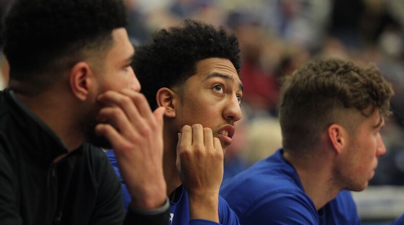 A Georgia State player lets his eyes wander to the scoreboard. HENRY TAYLOR / HENRY.TAYLOR@AJC.COM)
