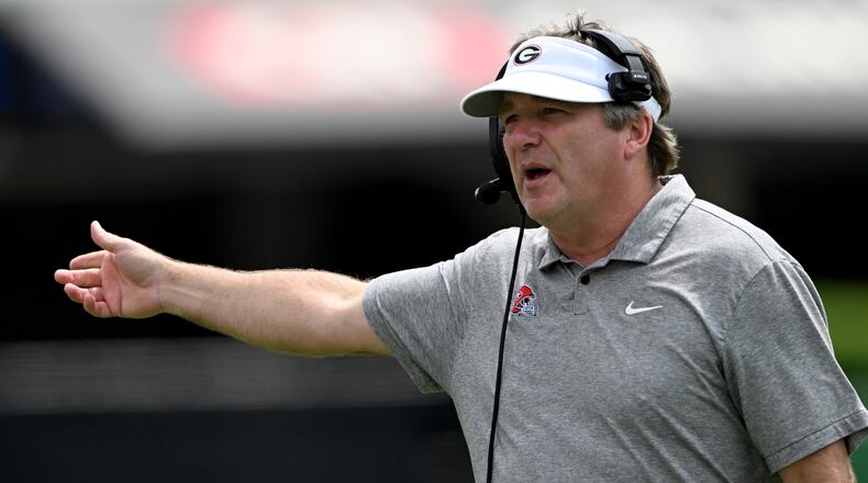 Georgia head coach Kirby Smart shouts instructions during the G-Day spring football game at Sanford Stadium on April 18. (Hyosub Shin/AJC)