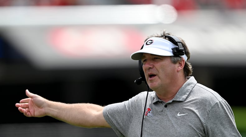 Georgia head coach Kirby Smart shouts instructions during the G-Day spring football game at Sanford Stadium on April 18. (Hyosub Shin/AJC)