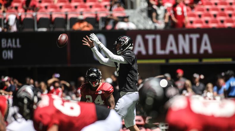 Atlanta Falcons quarterback Matt Ryan (2) takes a snap during open practice at Mercedes-Benz Stadium, Sunday, July 29, 2018, in Atlanta. BRANDEN CAMP/SPECIAL