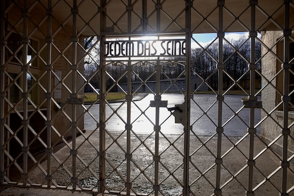 A view of the entrance gate of the Nazi death camp 'Buchenwald' with the inscription 'Jedem das Seine' (To Each His Own) in Weimar, Germany, on Jan. 10, 2020. (AP Photo/Markus Schreiber)