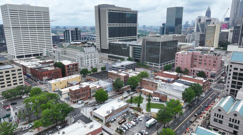 An aerial image shows South Downtown, where numerous local businesses are being revitalized across 16 acres and more than 50 buildings. This project represents the largest collection of historic real estate assets in Atlanta, making it one of the most ambitious downtown initiatives. (Miguel Martinez/AJC)