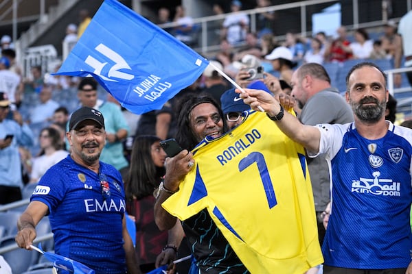 Fans cheer before the Club World Cup round of 16 soccer match between Manchester City and Al Hilal in Orlando, Fla., Monday, June 30, 2025. (AP Photo/Phelan Ebenhack)