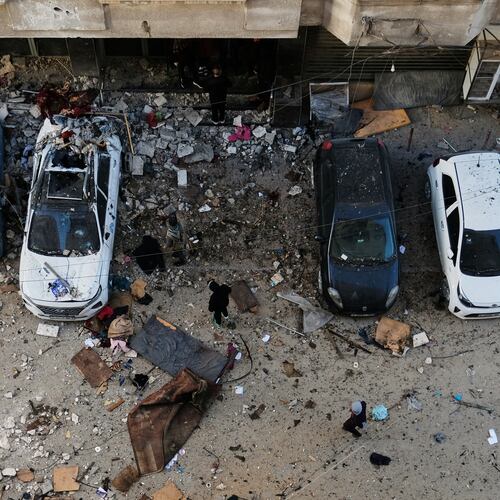 Palestinians survey the damage to an apartment building after an Israeli military strike killed several people in Gaza City Saturday, Jan. 31, 2026. (AP Photo/Jehad Alshrafi)