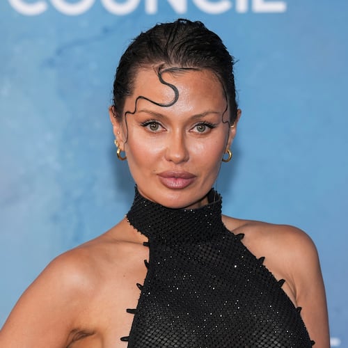 FILE - Victoria Bonya poses for photographers upon arrival at the amfAR gala at the Arsenale di Venezia, in Venice, Italy, on Sunday, Aug. 31, 2025. (Photo by Scott A Garfitt/Invision/AP, File)