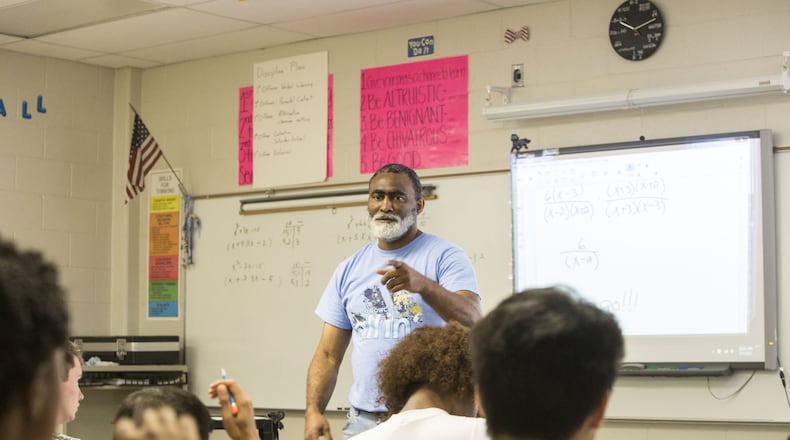 Preston Hughes, a math teacher at Meadowcreek High School, announces a test to his summer school class on July 7, 2017 in Norcross. Metro Atlanta school districts are seeking more than 1,000 school teachers in the next few weeks.  Chad Rhym/Chad.Rhym@ajc.com