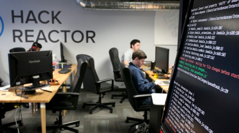 Coding students work on projects at Hack Reactor on Nov. 30, 2017.