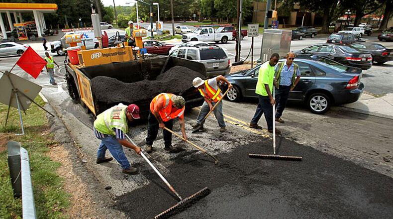 Twenty-seven street segments totaling about 2.9 miles will be resurfaced in Sandy Springs, funded in part by $997,921 in state grant monies. AJC FILE