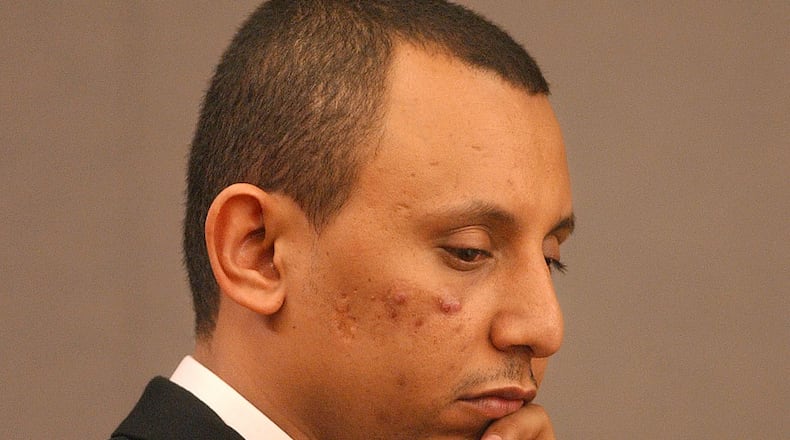 Khalid Adem, 30, is charged with aggravated battery and cruelty to children is in court during jury selection at GJAC Tuesday, October 24, 2006. Adem is born in Ethiopia, where circumcision is a common procedure for young girls. (VINO WONG / STAFF)