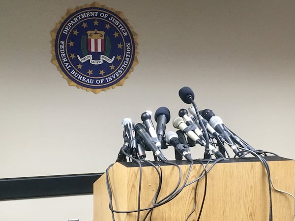 This Department of Justice briefing room is actually an AJC conference room. Photo: Jennifer Brett