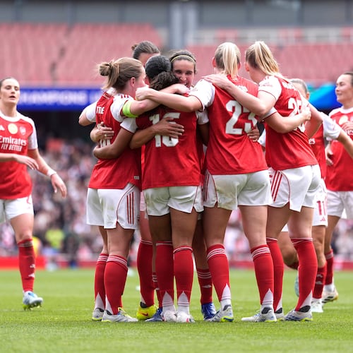 Arsenal's players celebrate their side's second goal scored by Olivia Smith during the Women's Champions League semi-final, first leg soccer match between Arsenal and OL Lyonnes in London, England, Sunday, April 26, 2026. (Andrew Matthews/PA via AP)