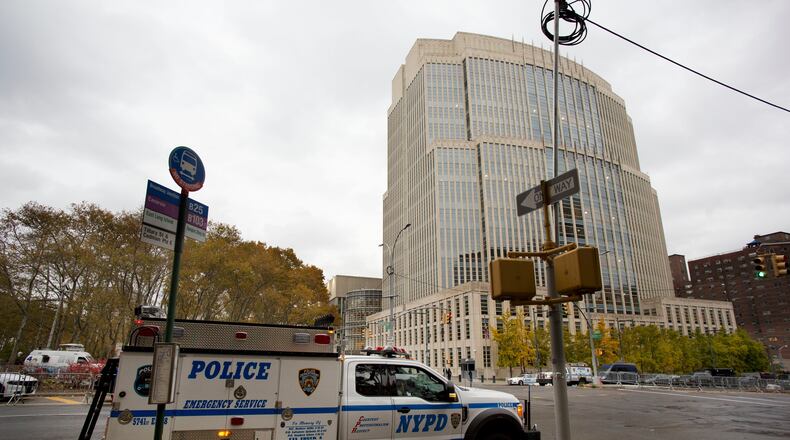 FILE - The New York Police Department has extra security in place in front of the Brooklyn Federal Courthouse for the start of jury selection in the trial of Joaquin "El Chapo" Guzman, Nov. 5, 2018, in New York. (AP Photo/Mark Lennihan, File)