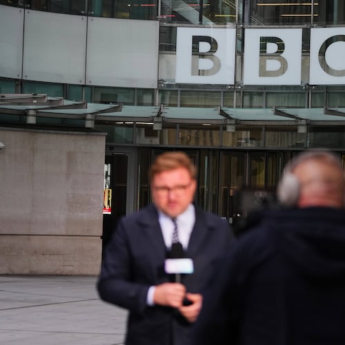 Journalists report outside BBC Broadcasting House in London, Tuesday, Nov. 11, 2025. (AP Photo/Kirsty Wigglesworth)