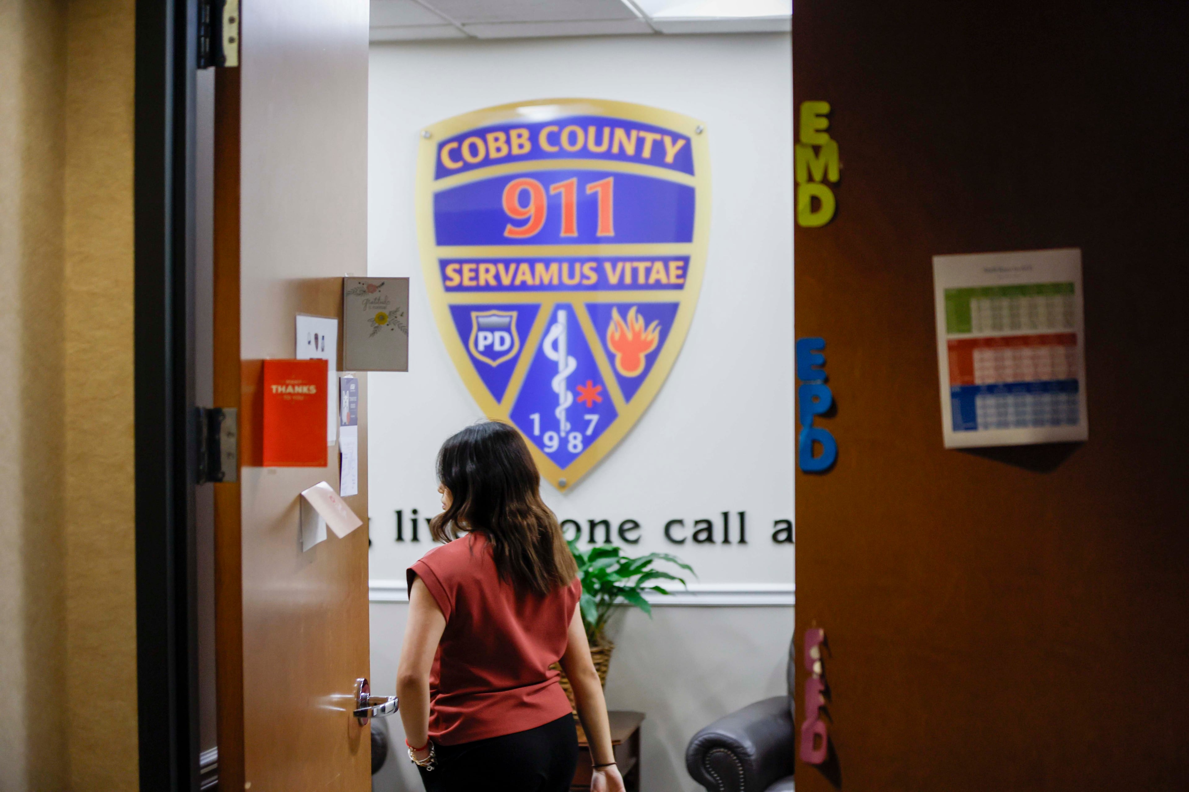 In August, the Cobb County 911 call center upgraded its systems with new technology that included the ability to receive video feeds from callers and use GIS to locate them. (Miguel Martinez/AJC)