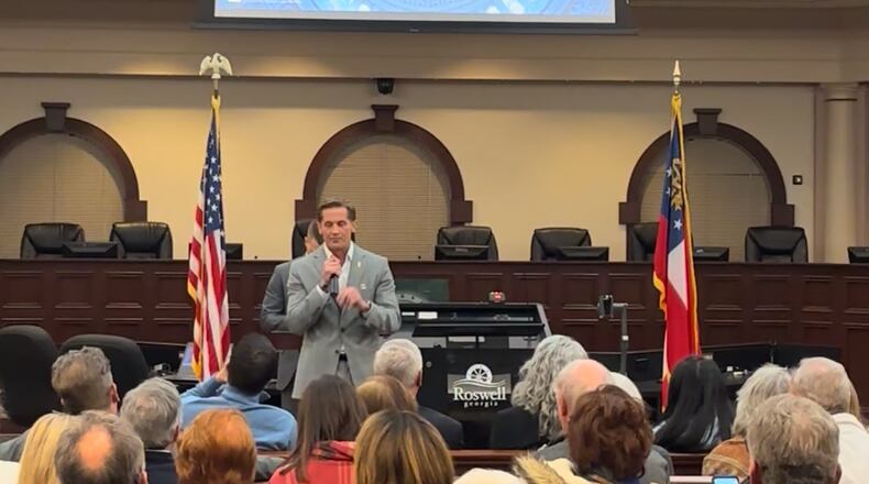 U.S. Rep. Rich McCormick was booed and jeered throughout a raucous town hall on Feb. 20, 2025. Greg Bluestein/AJC.