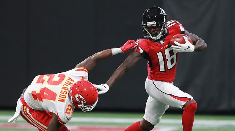 Falcons first-round draft pick, wide receiver Calvin Ridley, eludes Chiefs cornerback David Amerson for yardage on the opening kickoff Friday, Aug. 17, 2018, at Mercedes-Benz Stadium in Atlanta.