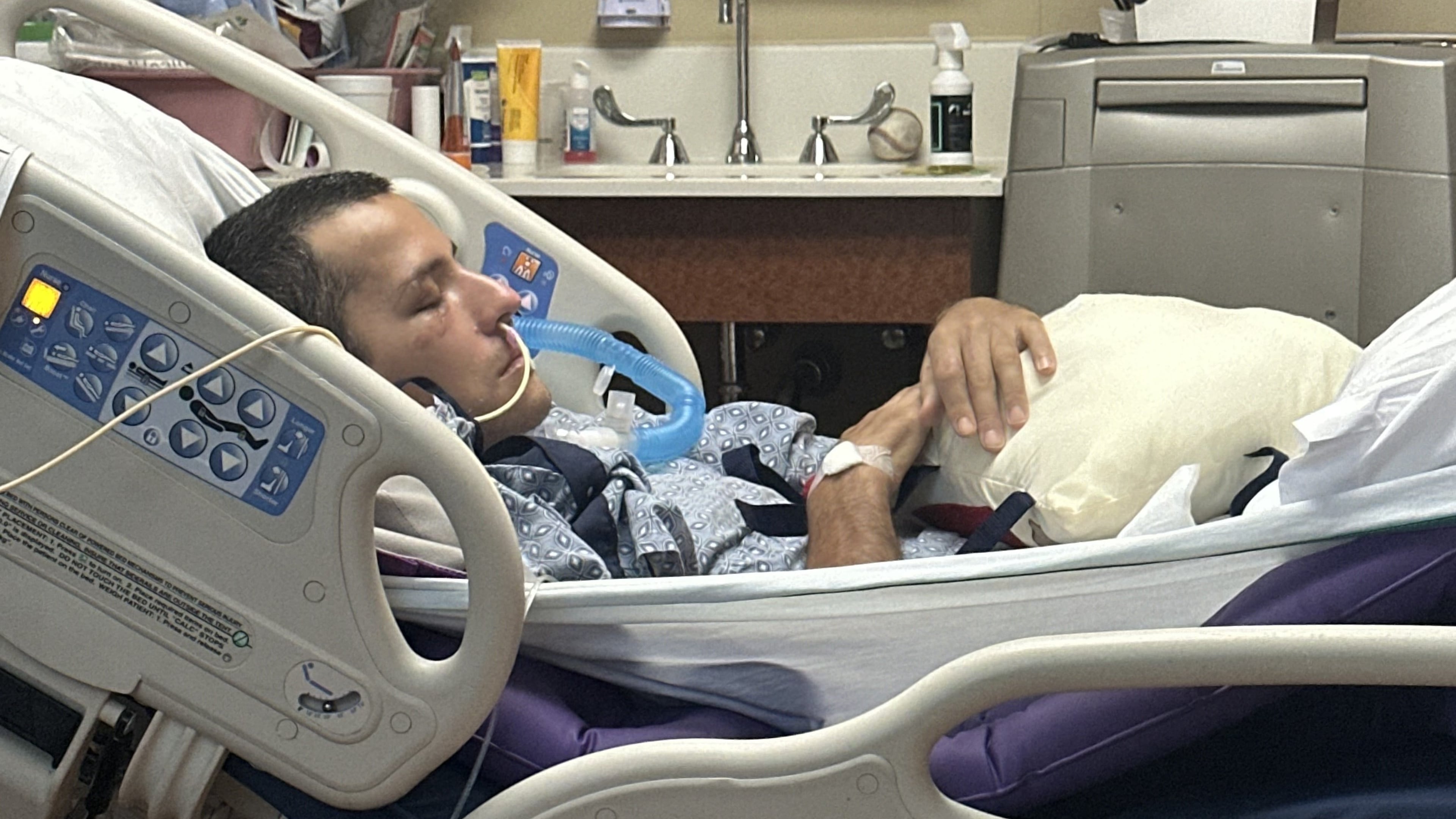 Mark Moczarski awoke from a two-week coma just as he was being put on a plane to fly back to Georgia. He is now being treated at Northside Hospital Gwinnett. (Courtesy Moczarski family)
