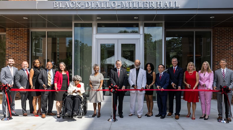 A ribbon is cut during the dorm dedication of Black-Diallo-Miller Hall. Photo courtesy of University of Georgia