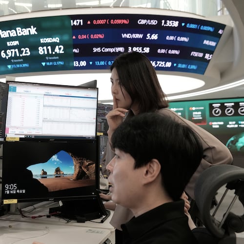 Currency traders watch monitors at the foreign exchange dealing room of the Hana Bank headquarters in Seoul, South Korea, Thursday, July 16, 2026. (AP Photo/Ahn Young-joon)