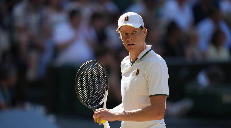 FILE - Jannik Sinner, of Italy, celebrates a point against Alexander Zverev, of Germany, in the men's singles final at Wimbledon Tennis Championships in London, July 12, 2026. (AP Photo/Kirsty Wigglesworth, File)