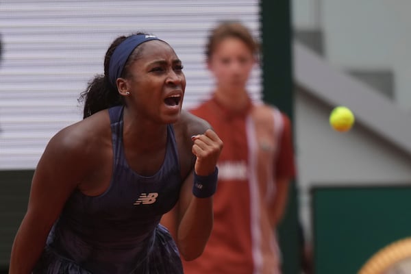 Coco Gauff of the U.S. celebrates as she won the fourth round match of the French Tennis Open against Russia's Ekaterina Alexandrova at the Roland-Garros stadium in Paris, Monday, June 2, 2025. (AP Photo/Thibault Camus)