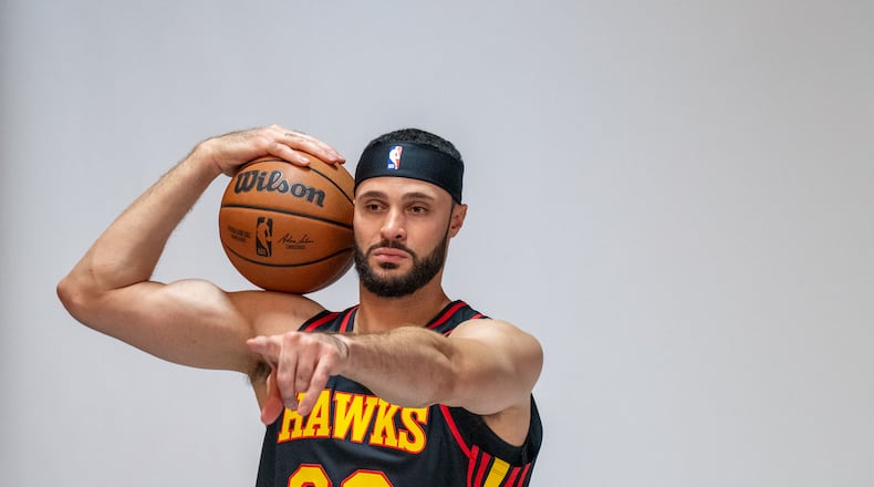Larry Nance Jr. poses for photos at media day. Hawks media day takes place on Monday, Sept 30, 2024 where media outlets including the Associated Press, Getty, NBA and many others gather to take photos, conduct interviews and gather footage.   (Jenni Girtman for The Atlanta Journal-Constitution)