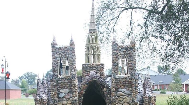 It took 27 months for Dewitt Boyd, who goes by “Old Dog,” and volunteers to complete the Notre Dame Cathedral in The Rock Garden in Calhoun. Photo: Dewitt Boyd