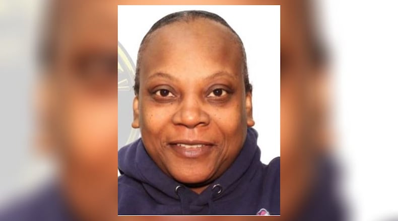 Dina Leach was charged with murder this week after a man was found shot to death inside a Clayton County motel room, authorities said.