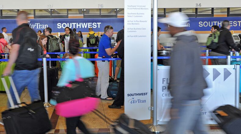 At each of Atlanta’s two major carriers — AirTran Airways and Delta Air Lines — the frequent flier programs are undergoing transformations that will change the way you earn points for free flights.